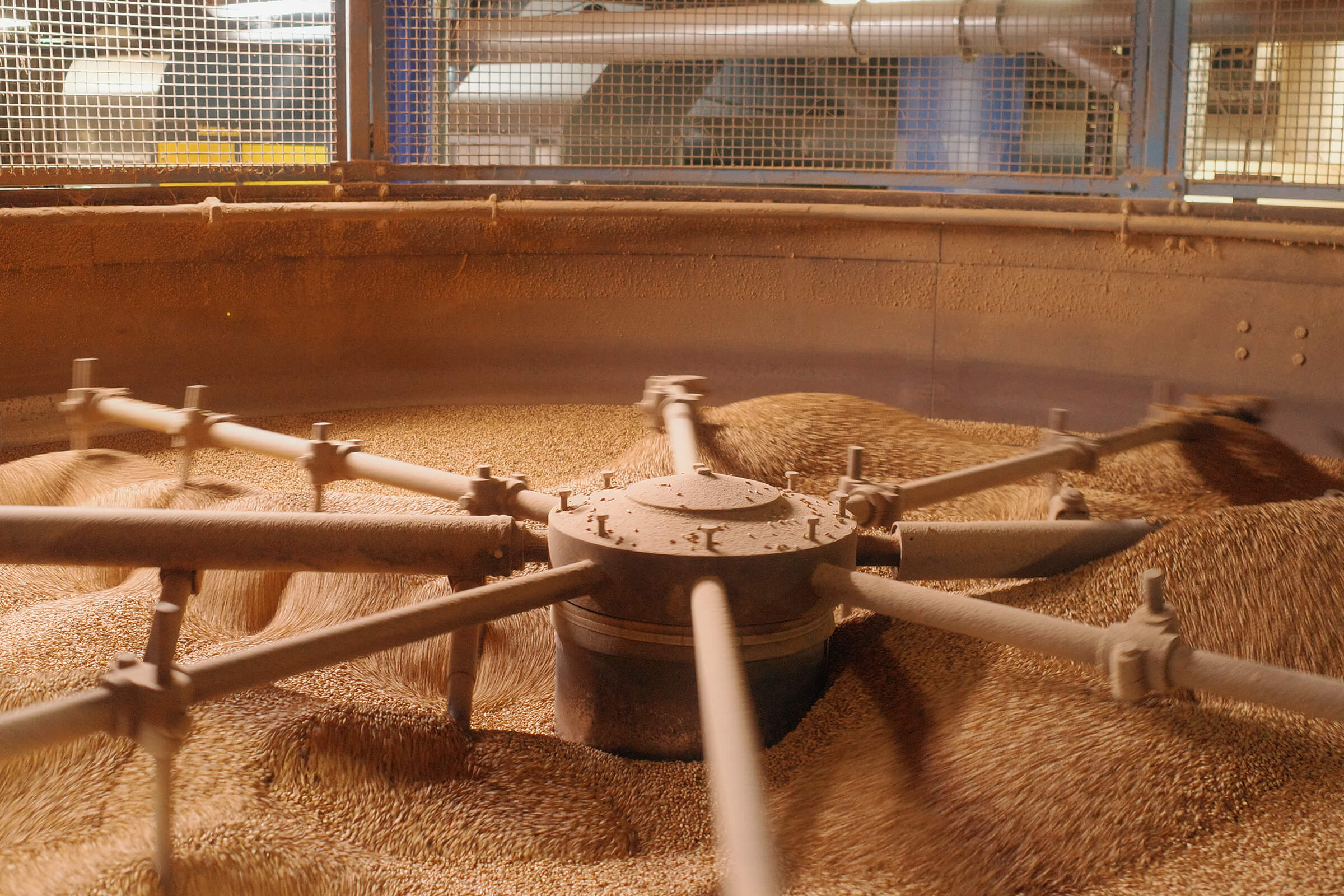 Barley is turned in the roaster in the Roast House at Bairds Malt Witham maltings plant in Essex, UK