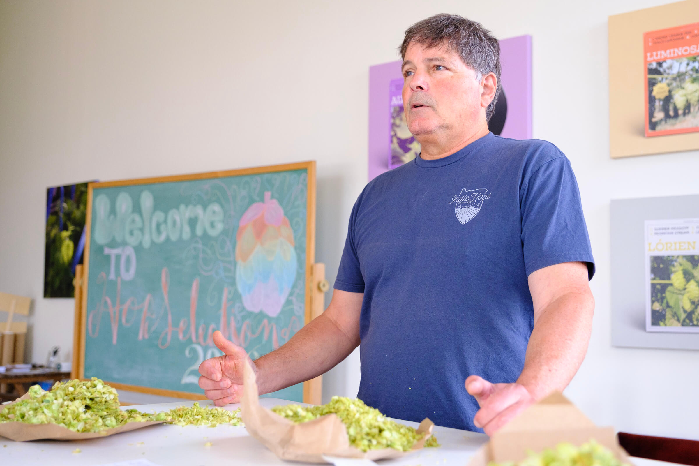 Jim Solberg - co-founder & CEO of Indie Hops - stands at a table during DEYA Brewing Company’s Strata® hop selection at Indie Hops HQ in Portland, Oregon.