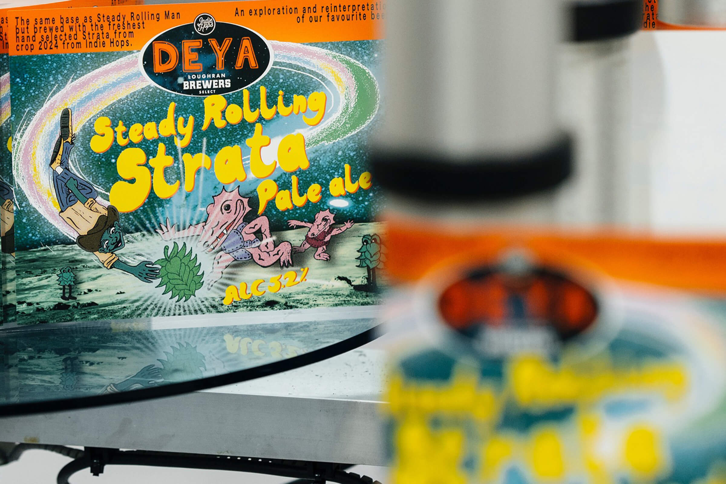Canning line showing the labels for the 2024 production of DEYA’s ‘Steady Rolling Strata’ pale ale featuring Indie Hops Strata®.