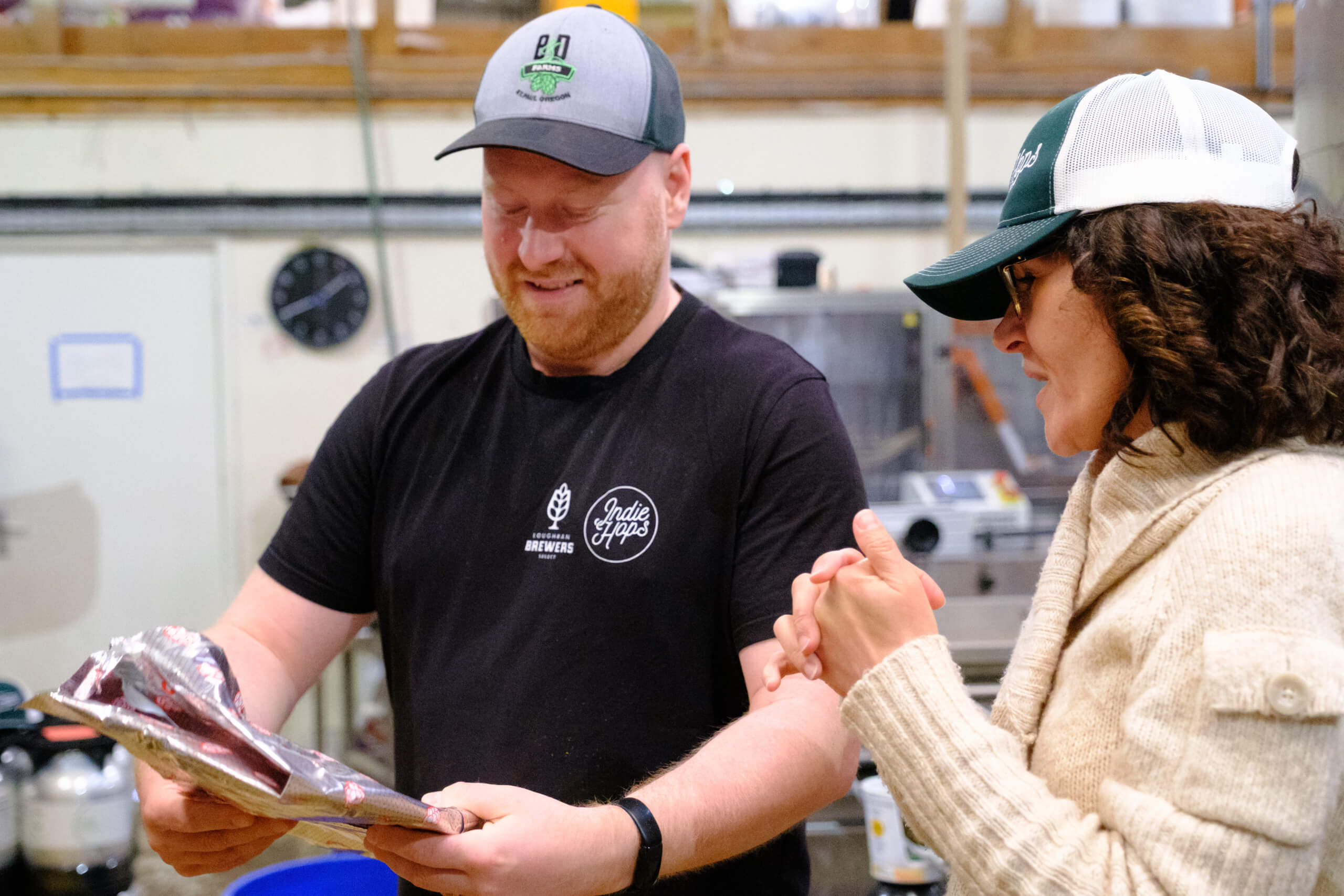 Dan Rybinski (Loughran Brewers Select) & Anca Solberg of (Indie Hops) with a foil of Indie Hops Strata® CGX™ during a collab brew day